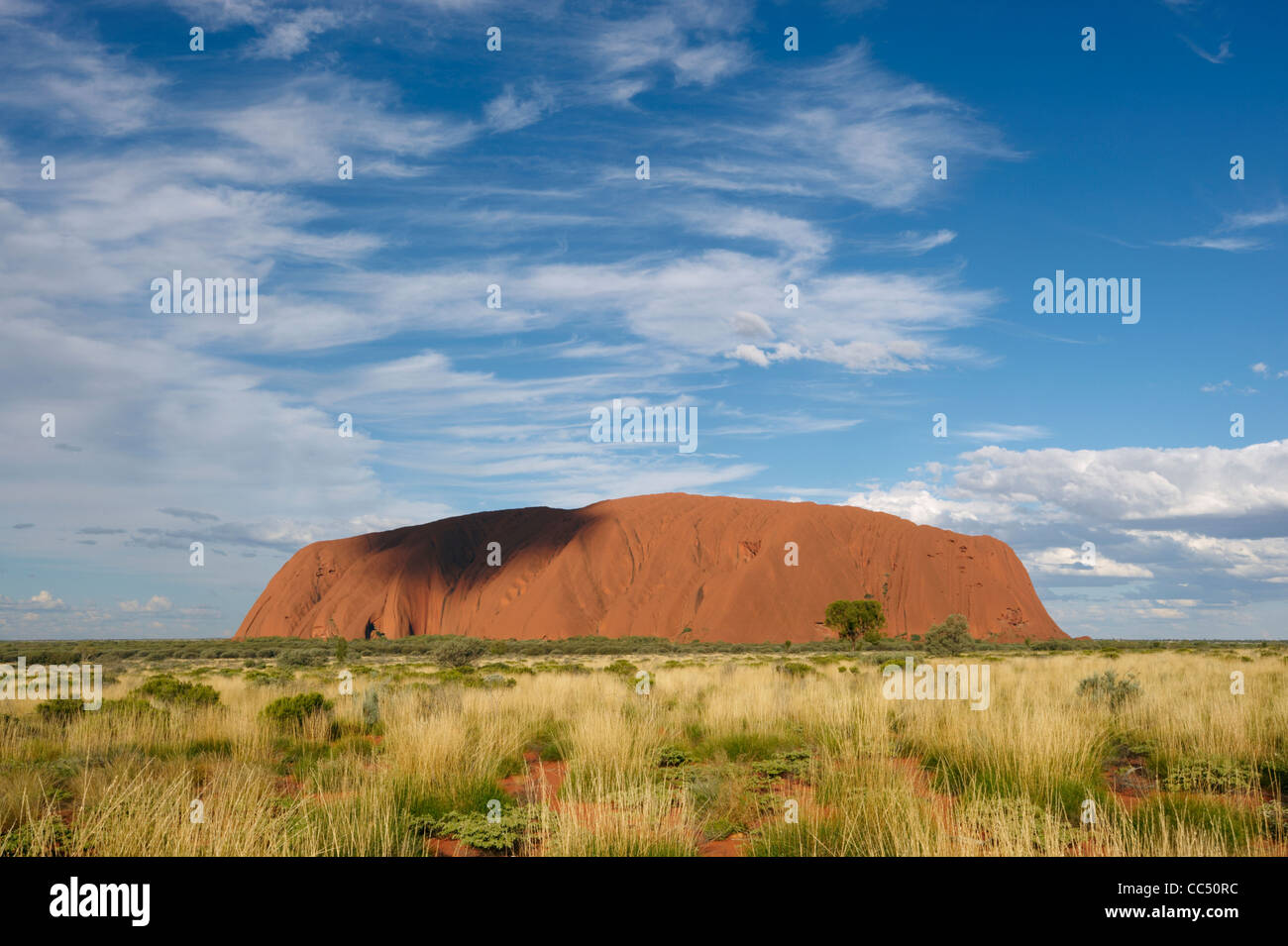 Cloud shadow on Ayers Rock, Uluru-Kata Tjuta National Park,Northern Territory, Australia Stock Photo