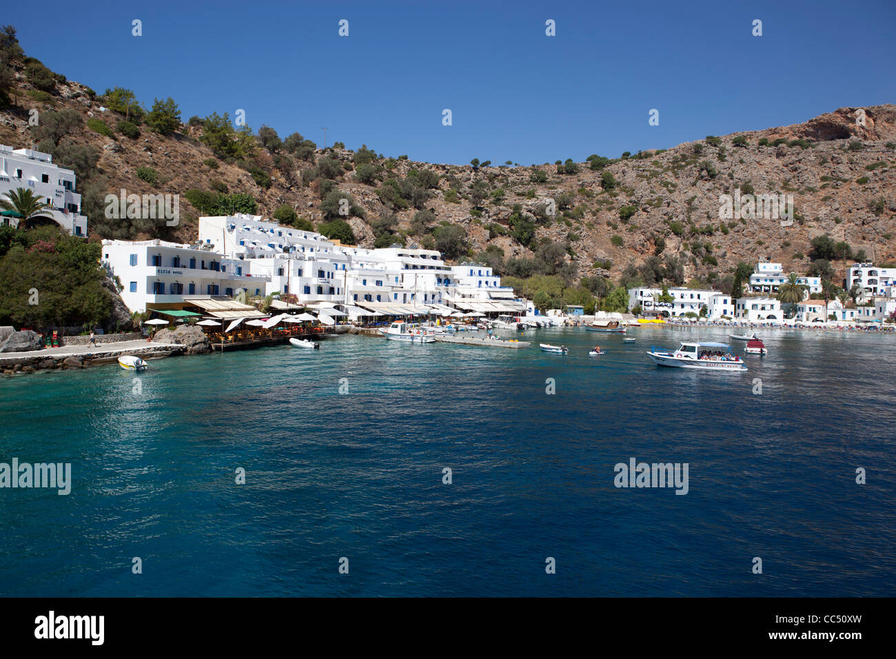 View of the village of Loutro in South Crete island in Greece. White houses next to the water. Stock Photo