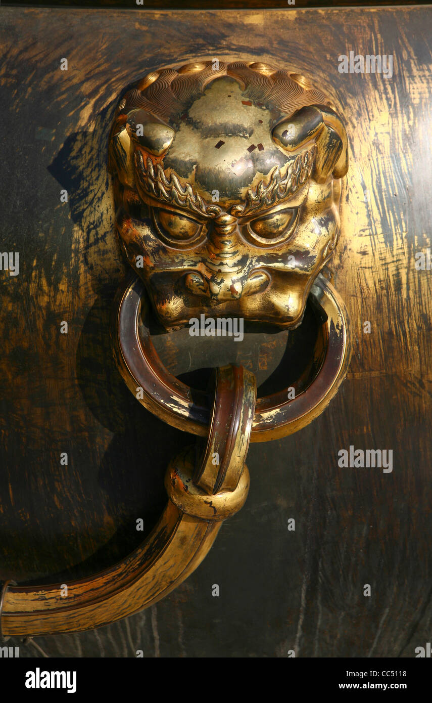 Beast shaped handle of water vat, Forbidden City, Beijing, China Stock Photo