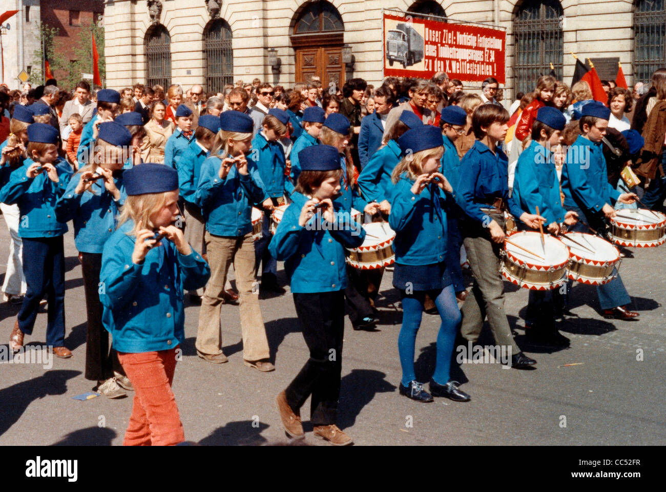 Demonstration on May 1st, 1973 in East Berlin with a music group of the national childrens organization 'Ernst Thaelmann'. Stock Photo