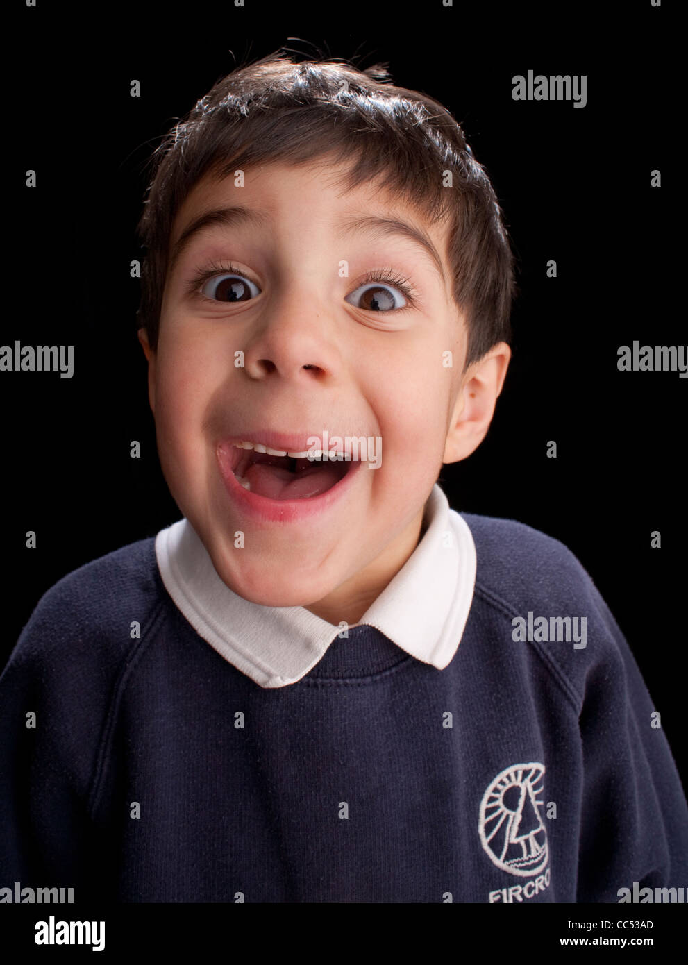 Boy smiling, studio shot Stock Photo