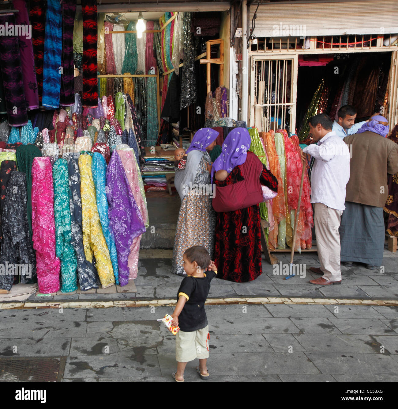 Turkey, Sanliurfa, bazaar, textile shop, people, Stock Photo