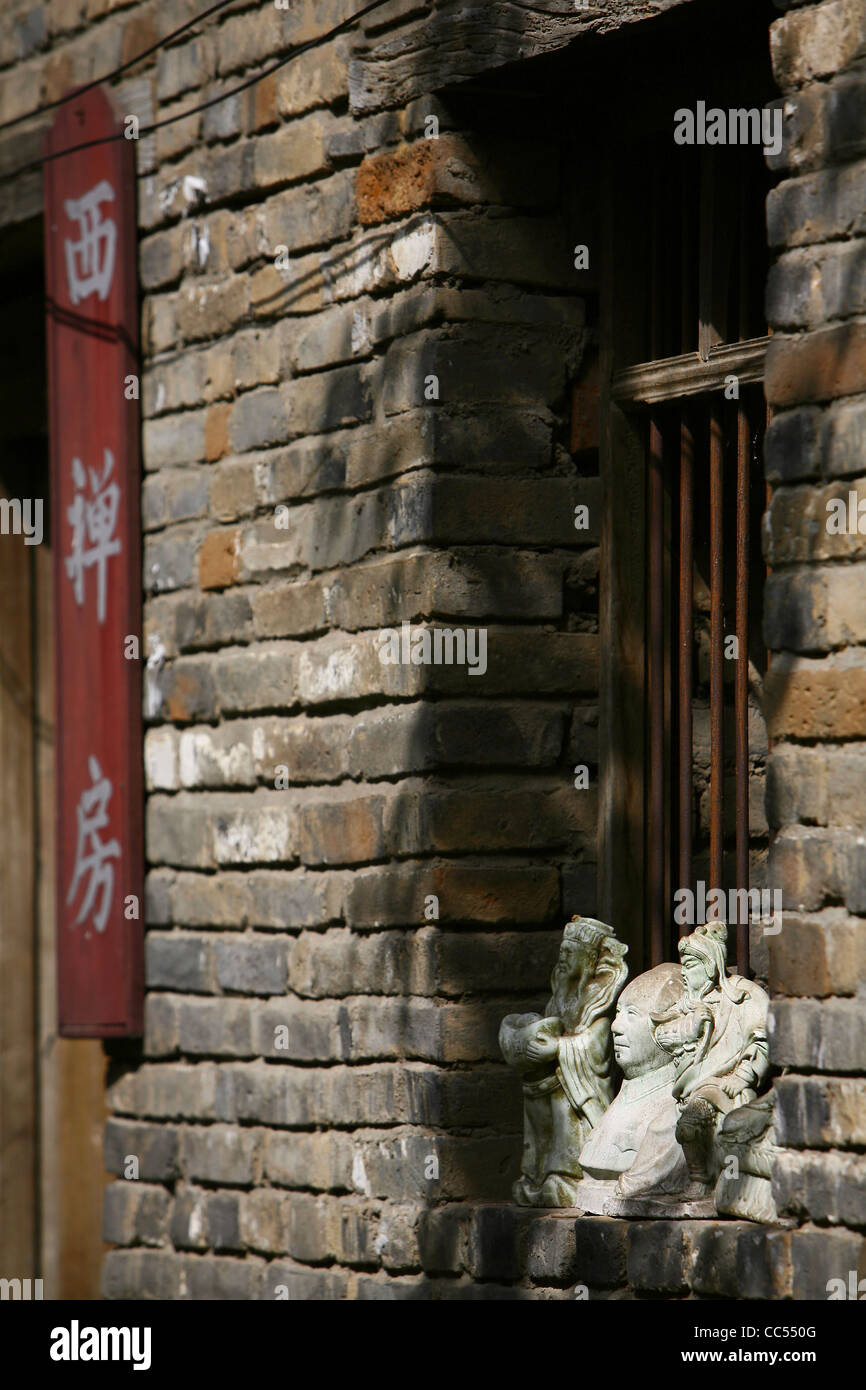 Statues on the windowsill, Fuxi Divinatory Pavilion, Shangcai, Henan , China Stock Photo