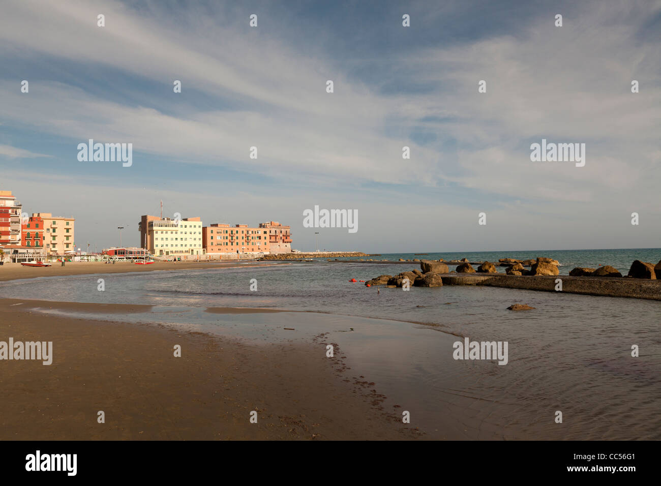 Anzio beach and sea defences - breakwater - empty at the end of a summers evening Stock Photo