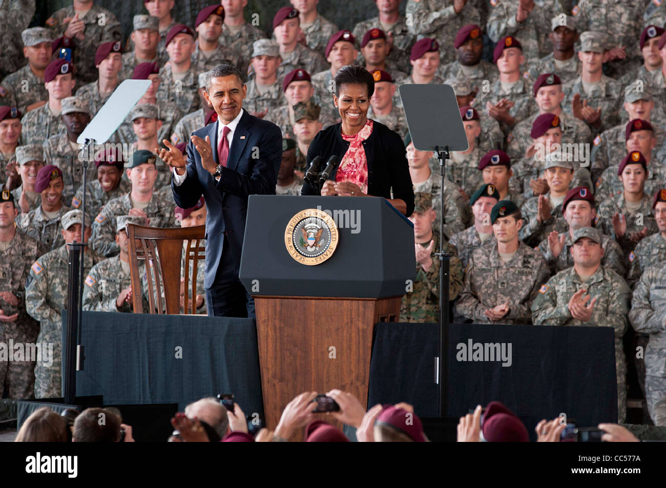 First lady Michelle Obama and President Barack Obama applaud US Service members and their