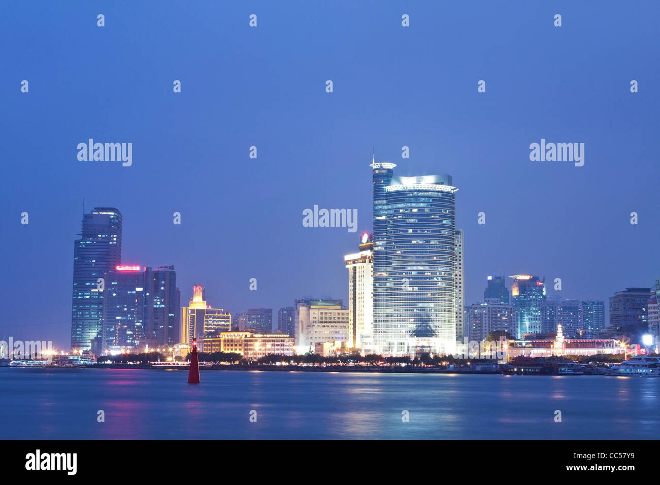 Xiamen downtown at night along the coast Stock Photo