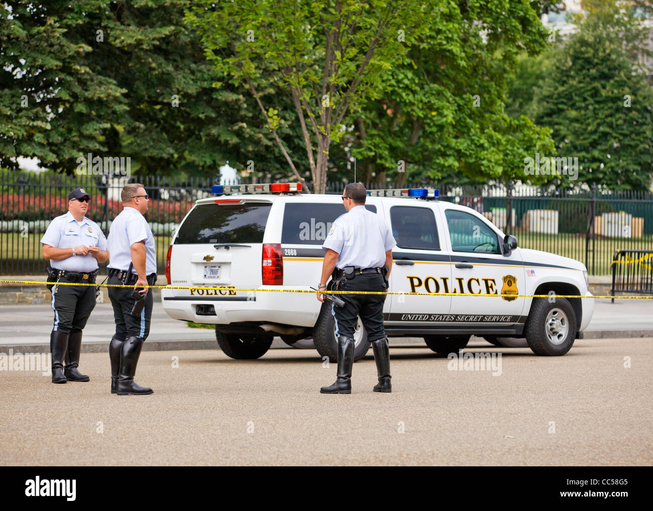 US Secret Service police officers standing behind police line - Washington, DC USA Stock Photo