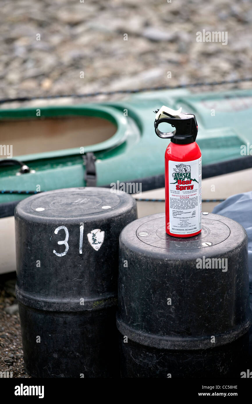 Bear pepper spray and bear resistant food canisters. Glacier Bay National Park. Alaska. USA Stock Photo
