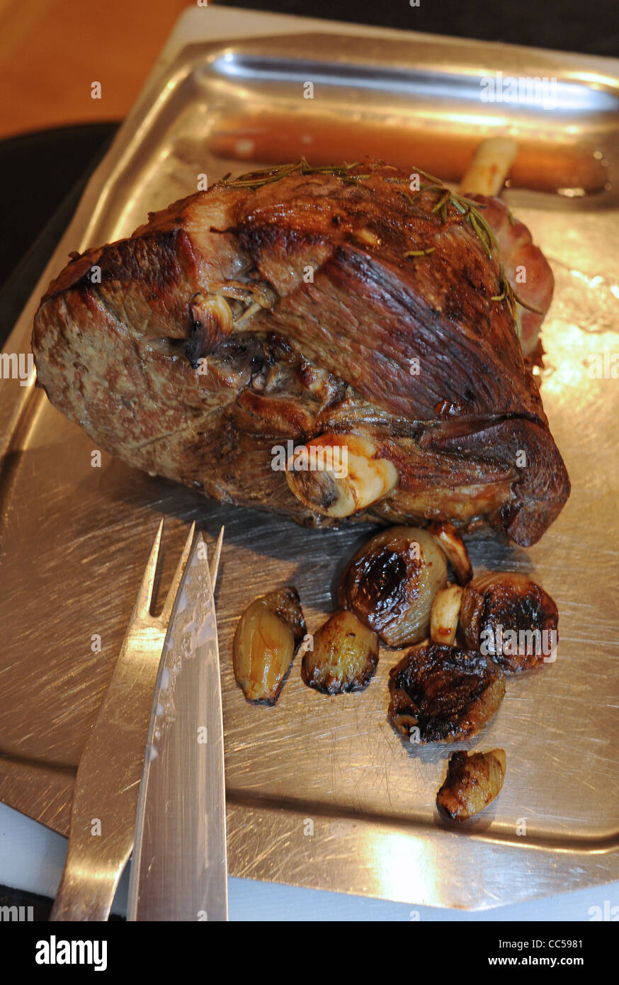 Roast leg of lamb ready to carve for traditional British Sunday lunch UK Stock Photo Alamy
