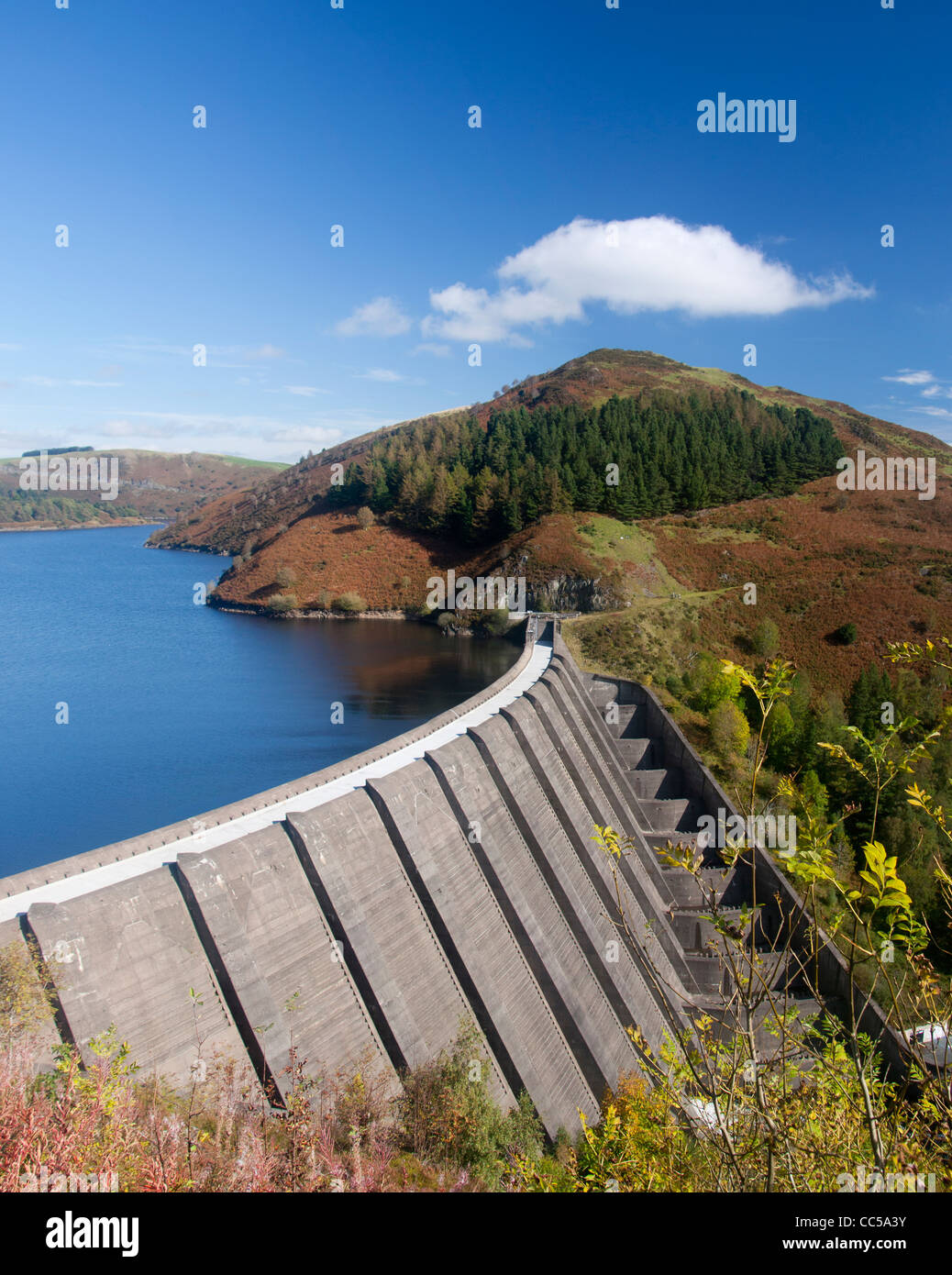 Llyn Clywedog Dam and Reservoir in early autumn Cambrian Mountains Near Llanidloes Powys Mid Wales UK Stock Photo