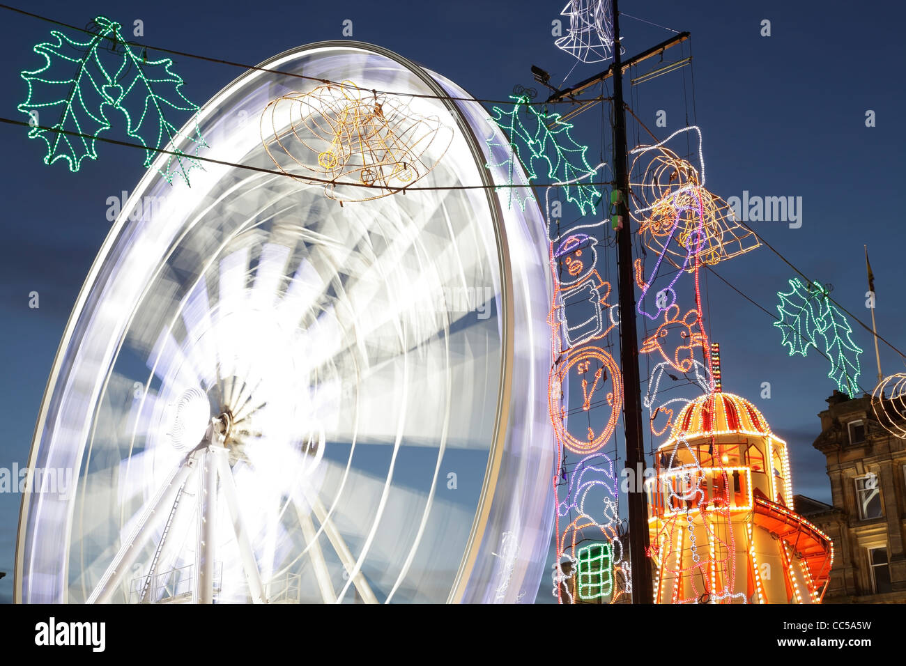 The temporary Christmas Observation Wheel on George Square, Glasgow, Scotland, UK Stock Photo