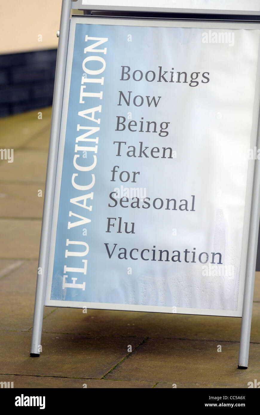 Seasonal flu vaccination sign, UK Stock Photo