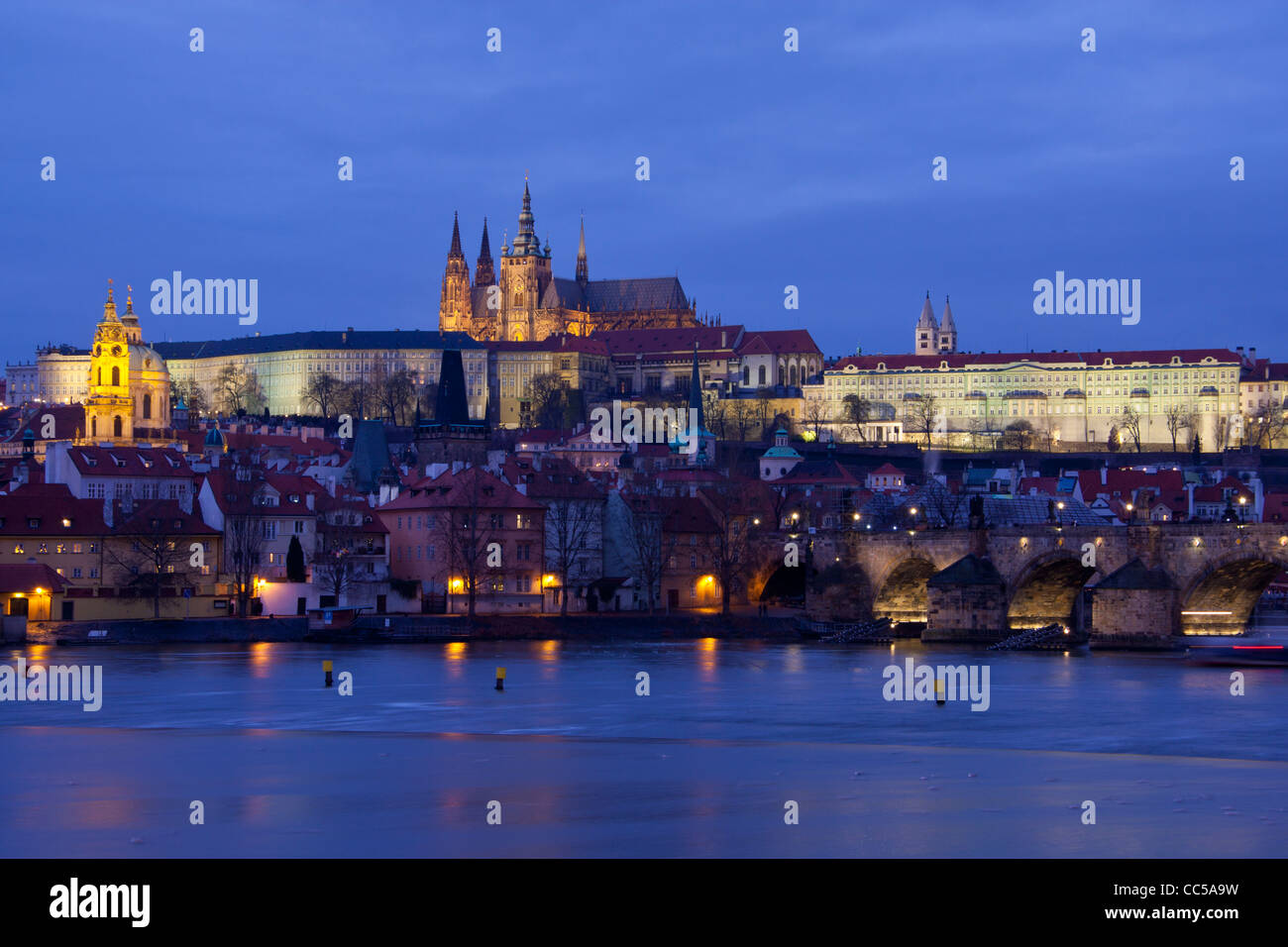 Prague Castle District, St Vitus' Cathedral, Lesser Town, Charles Bridge and River Vltava at night Prague Czech Republic Europe Stock Photo