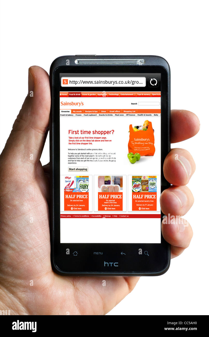 Grocery shopping online at Sainsbury's on an HTC smartphone Stock Photo