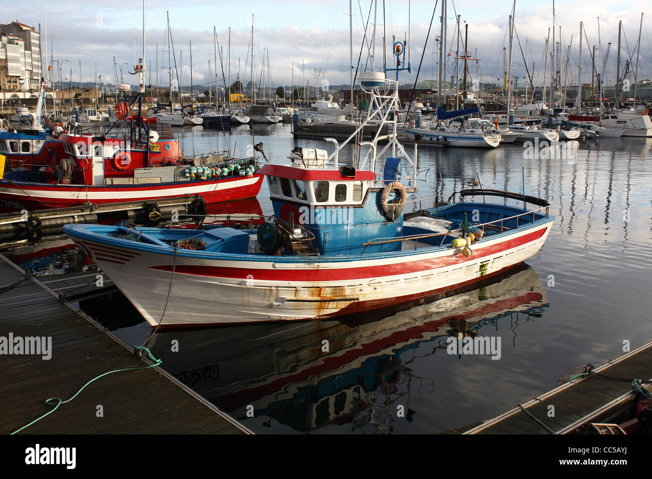 fishing boats moored at the port Stock Photo - Alamy