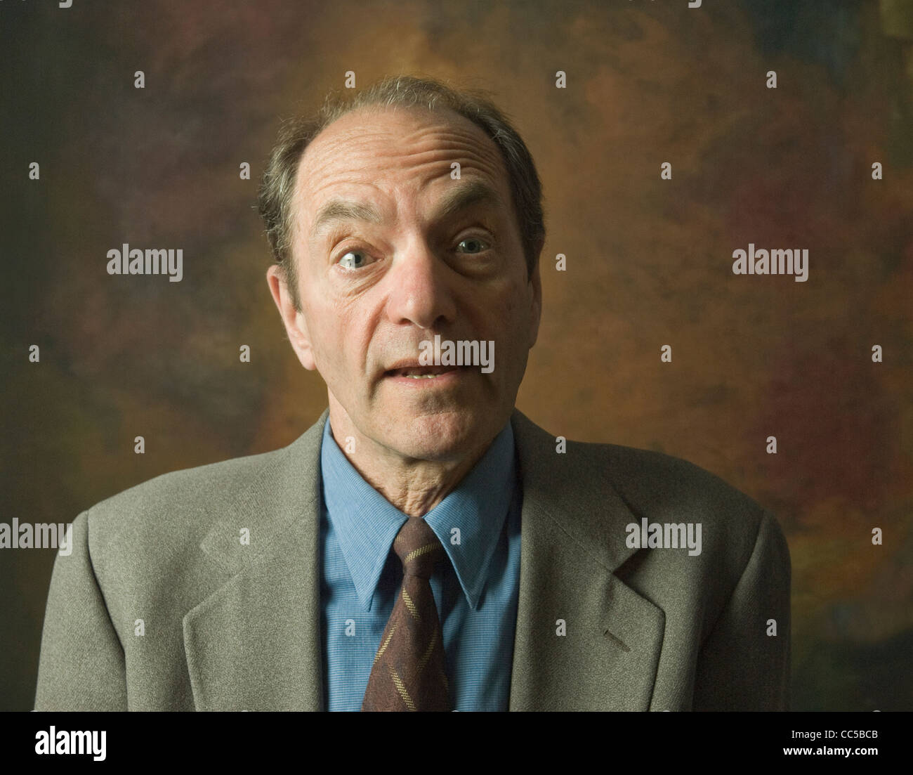 portrait of surprised man looking at camera Stock Photo