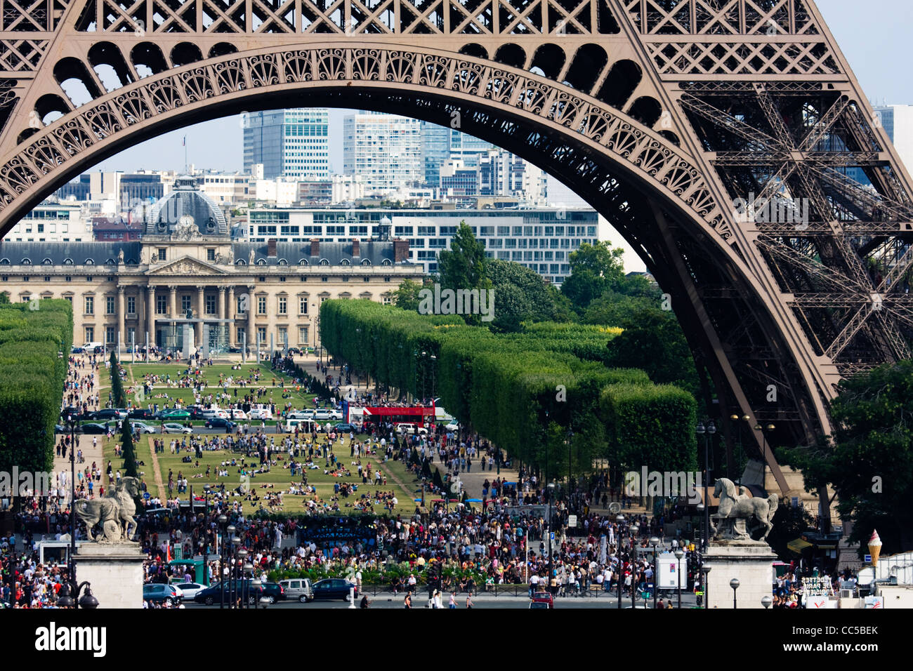 Crowds under Eiffel Tower and on Champ de Mars, Paris, France. Stock Photo