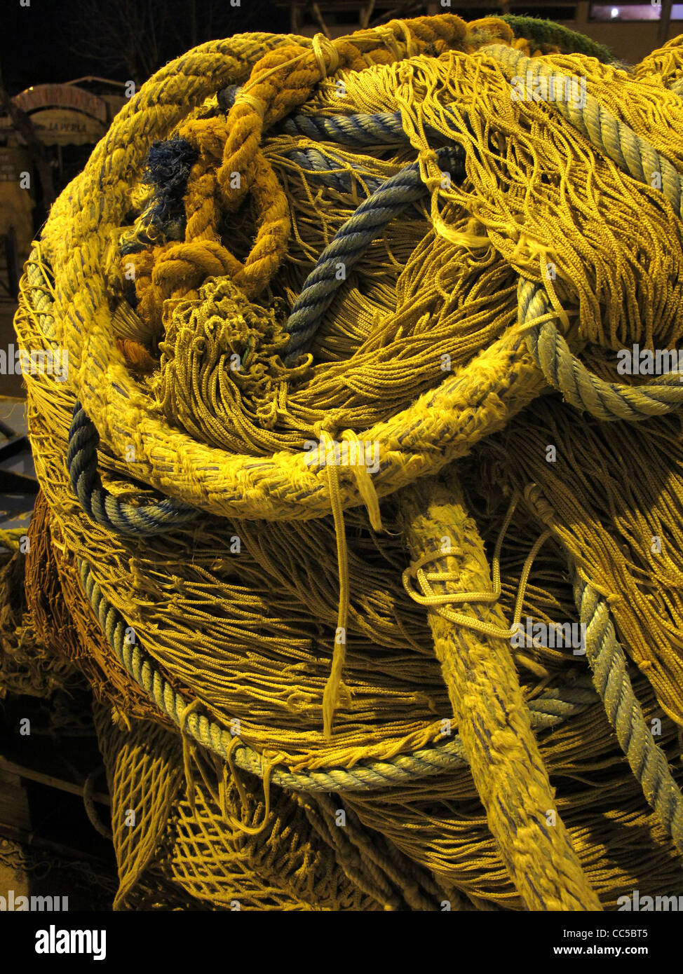 close up of fishing rope and nets in dock port harbour at night Stock ...