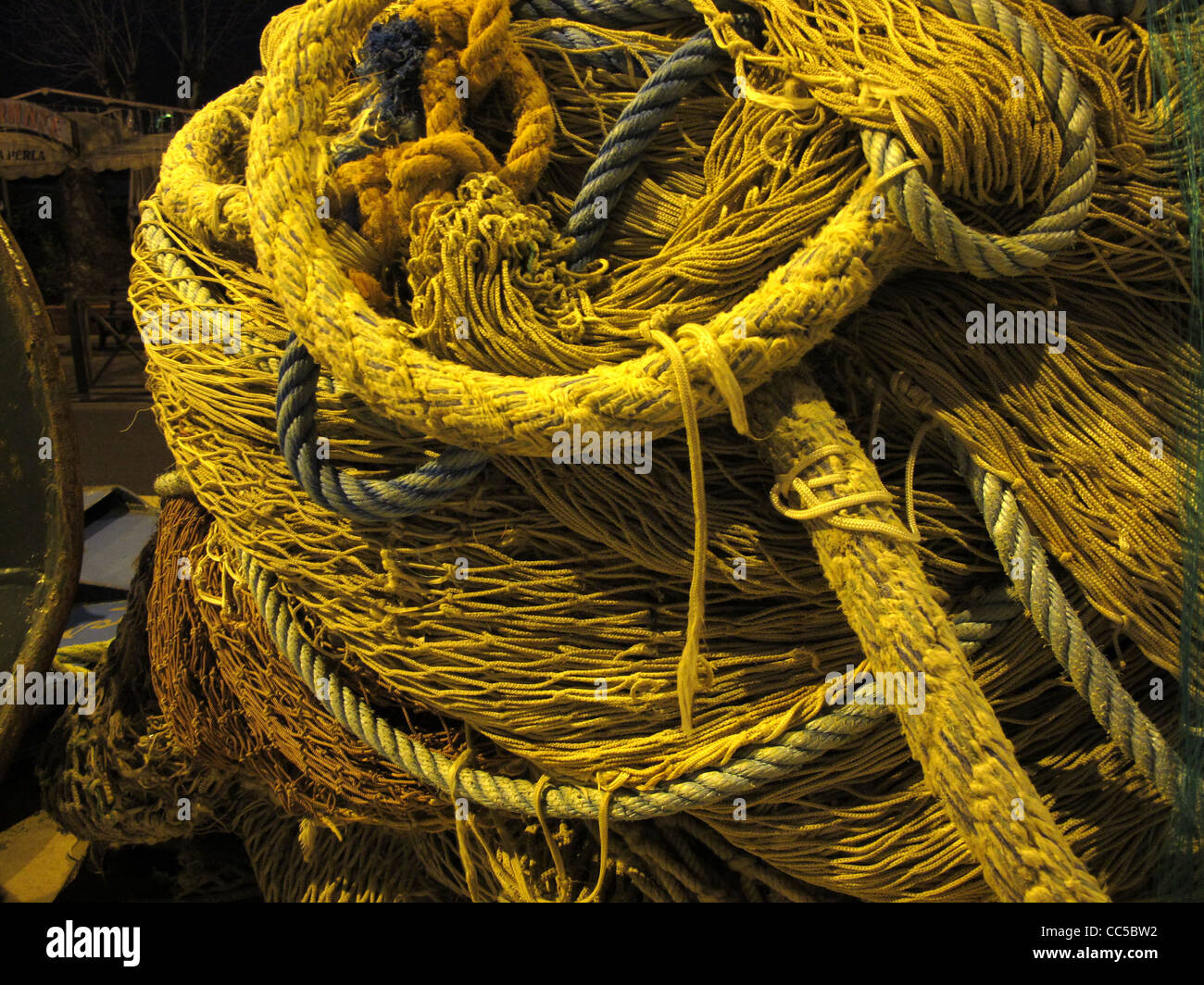 close up of fishing rope and nets in dock port harbour at night Stock ...