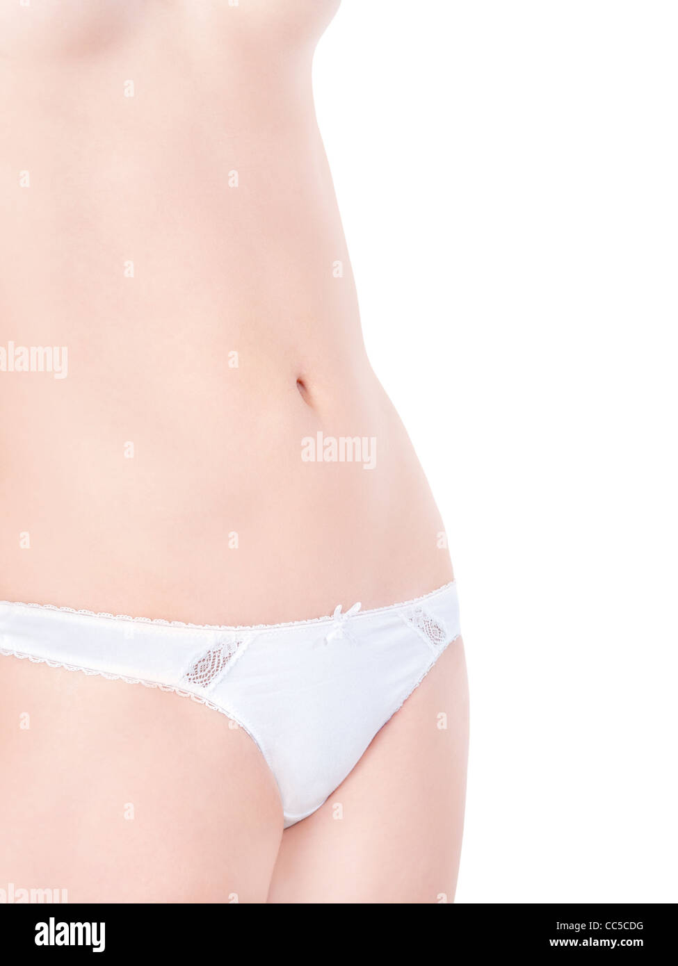 Closeup of a beautiful nude woman in white cotton panties, isolated on  white background Stock Photo - Alamy
