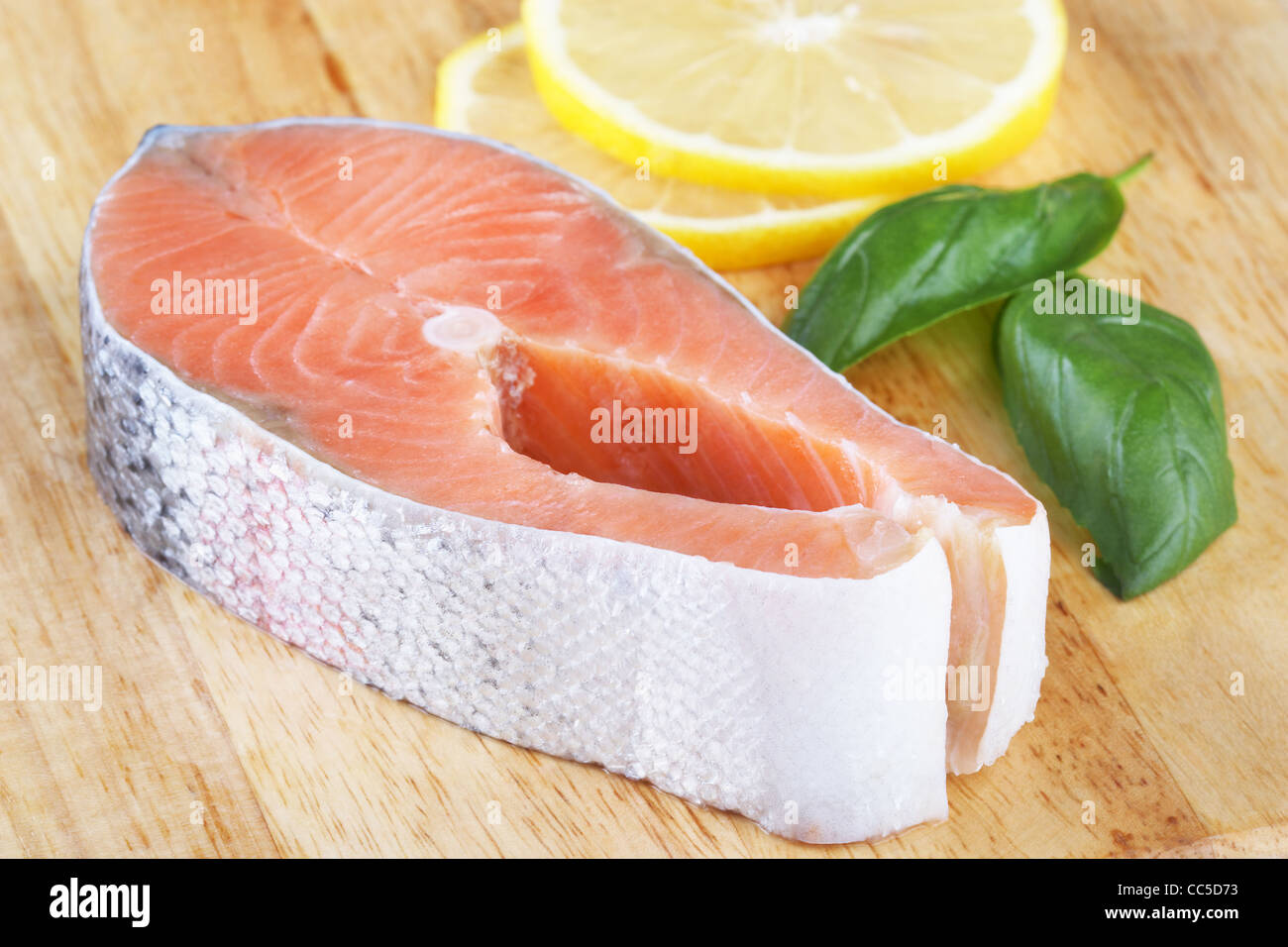 Fish, Trout, Chum Salmon, Humpback, A Piece Baked, Grilled, With A Slice Of  Lemon And Lettuce Stock Photo, Picture and Royalty Free Image. Image  125357561.