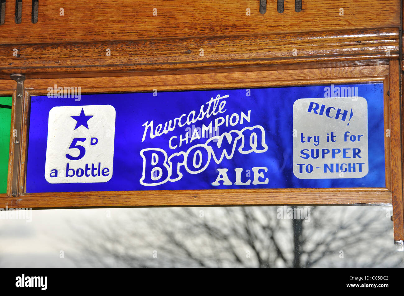 Glass adverts on tram in Beamish, The North of England Open Air Museum, near Stanley, County Durham, England, United Kingdom Stock Photo