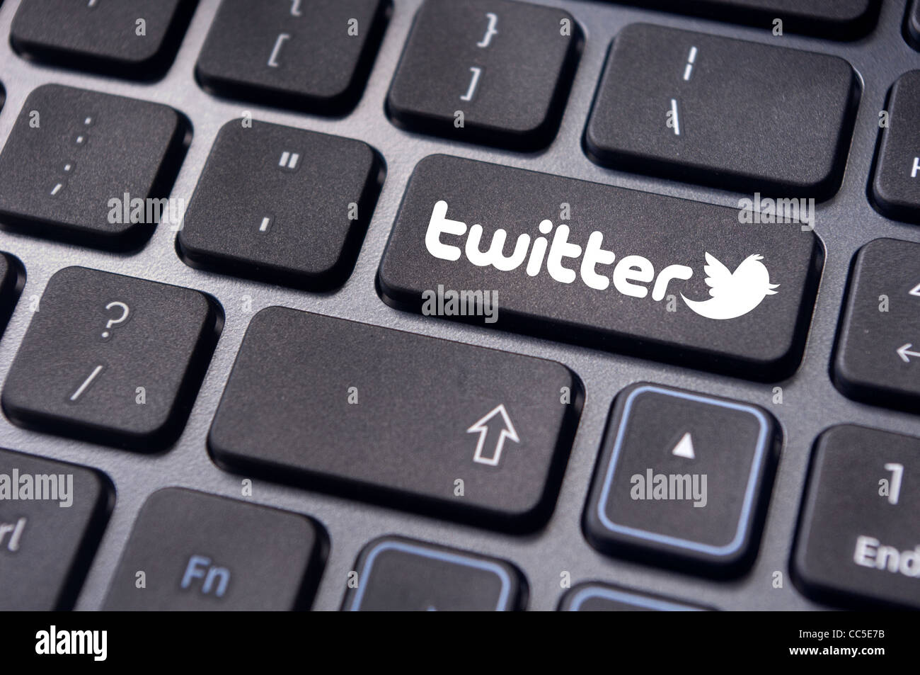 keyboard enter key with twitter icons, for social media concepts. Stock Photo