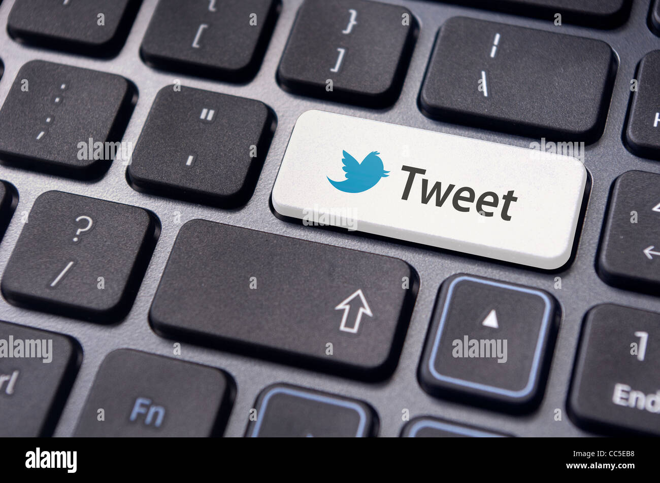 keyboard enter key with twitter icons, for social media concepts. Stock Photo
