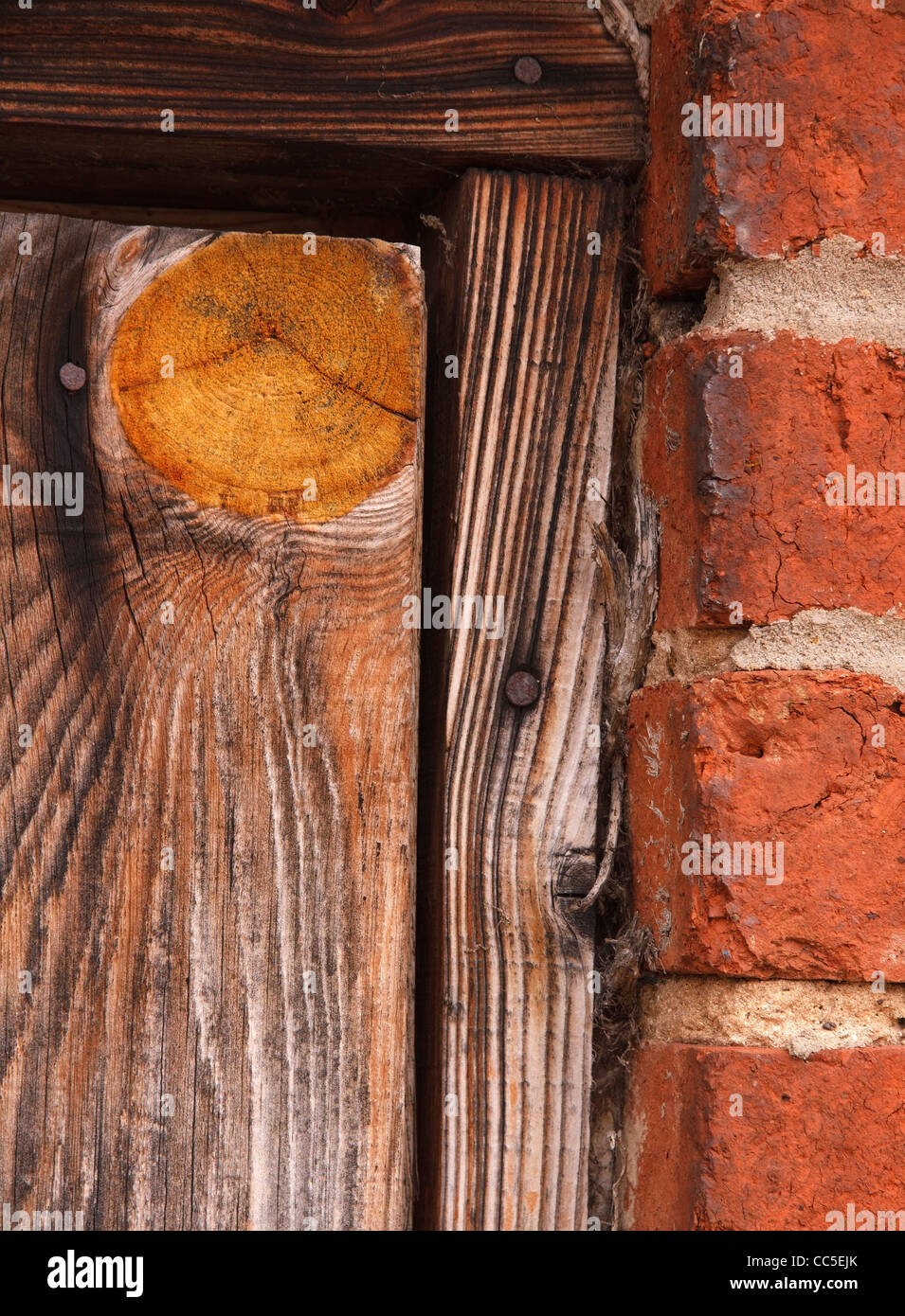 Colourful old wood grain and knot detail, Lincolnshire, England, UK Stock Photo