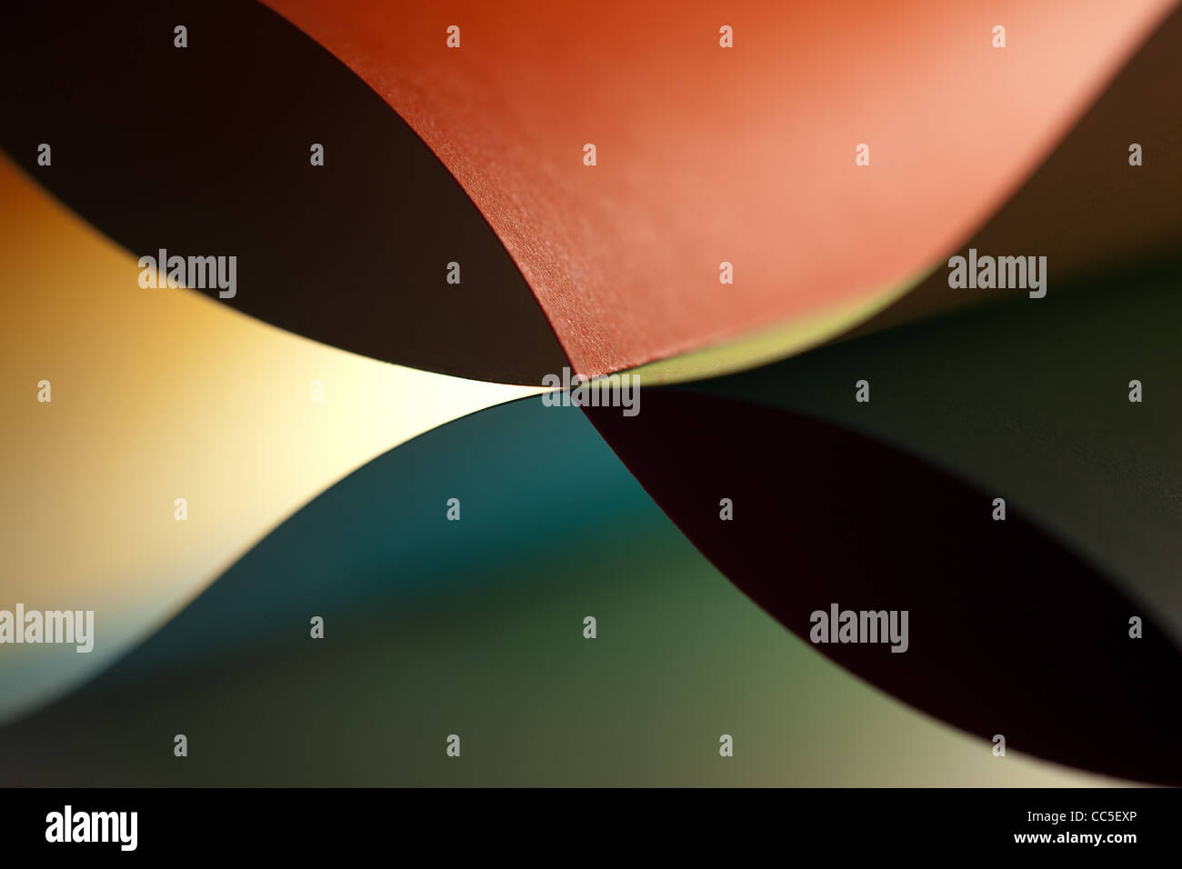 graphic abstract image of colorful origami pattern made of curved ...