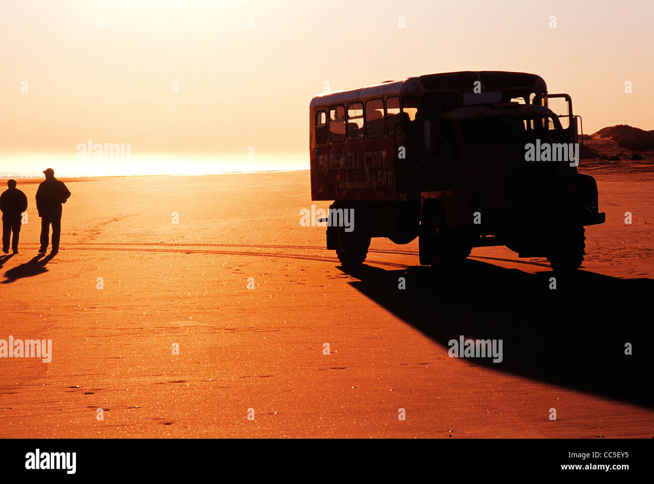 Truck on Tahunanui Beach at sunset, Nelson, New Zealand Stock Photo