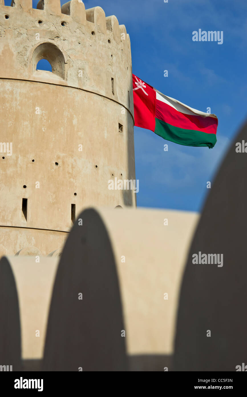 Picture of fort and Omani flag near Ras al Hadd, southern Oman Stock Photo
