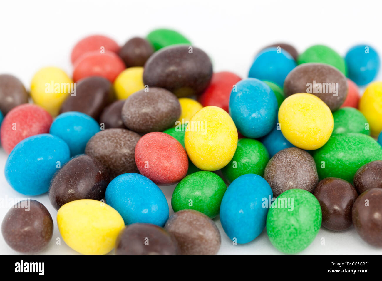 much colorful sweet candy on white background Stock Photo - Alamy