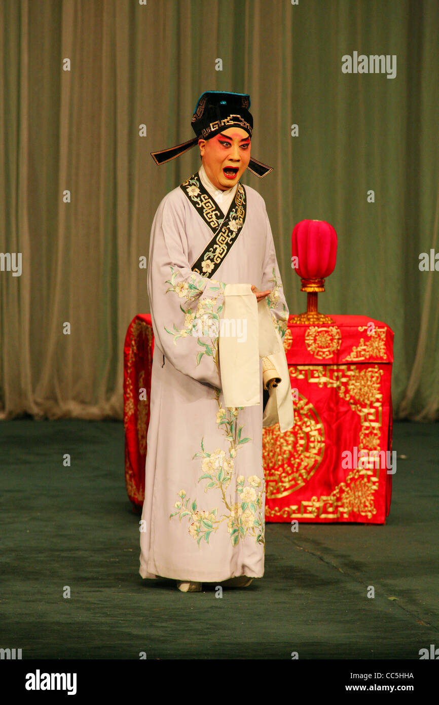 Male Peking opera performer singing, Beijing, China Stock Photo