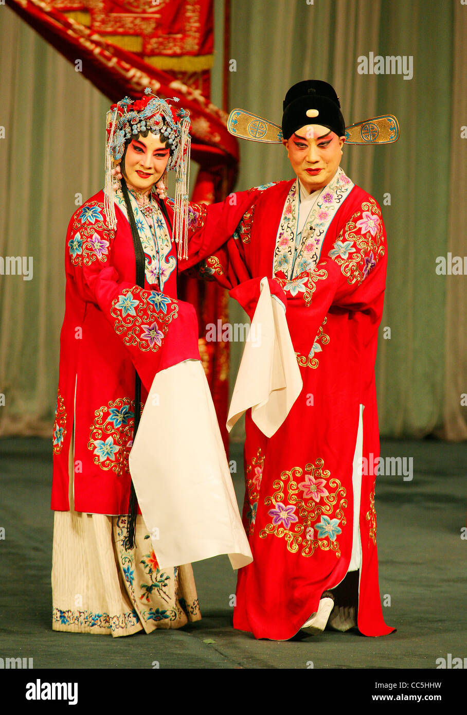 Peking opera performers performing wedding, Beijing, China Stock Photo