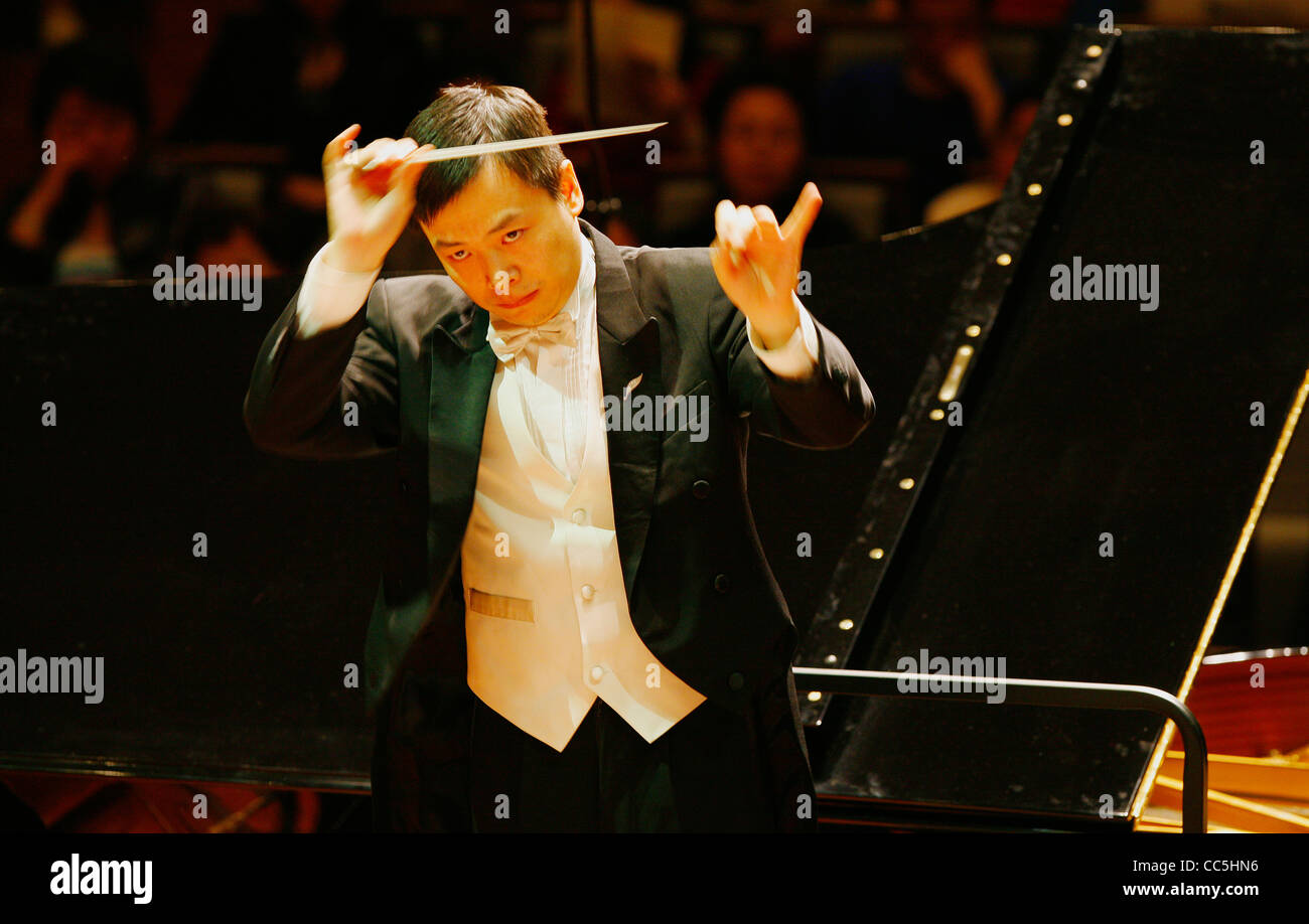 Man conducting an orchestra, Beijing, China Stock Photo