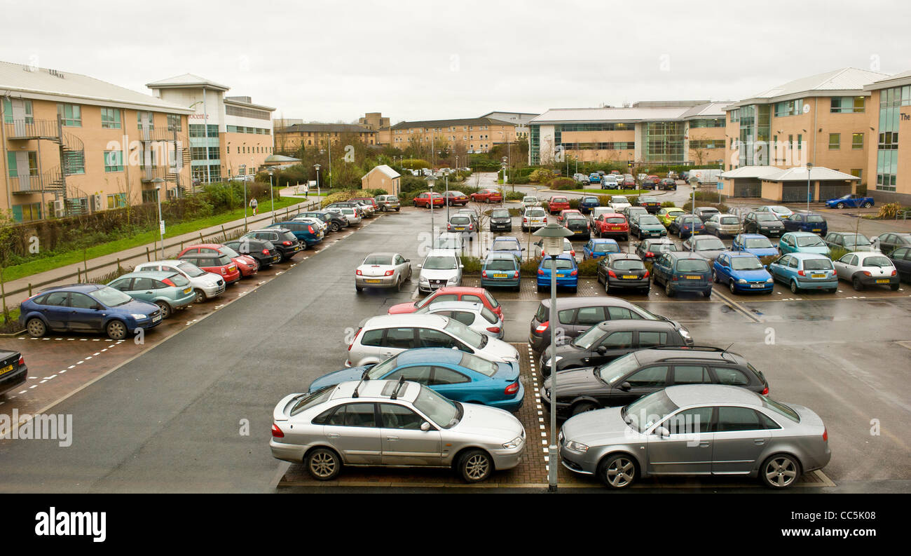 Full car park at office development Stock Photo