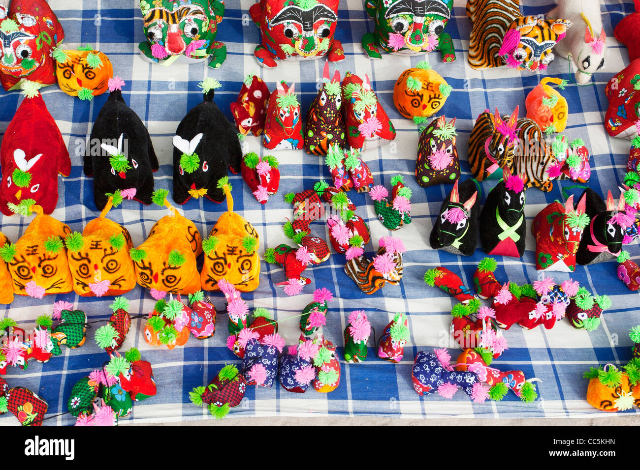 Colorful dolls for sale, Qikou Old Town, Lvliang, Shanxi , China Stock Photo
