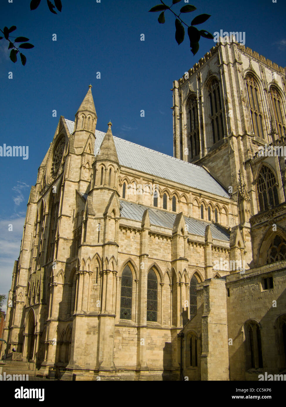 Exterior view of the south transept of York Minster seen against a blue sky on a sunny summer day. Stock Photo