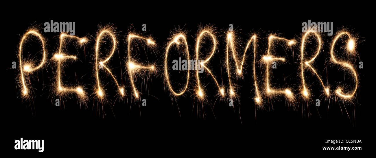 Word performers written sparkler Stock Photo