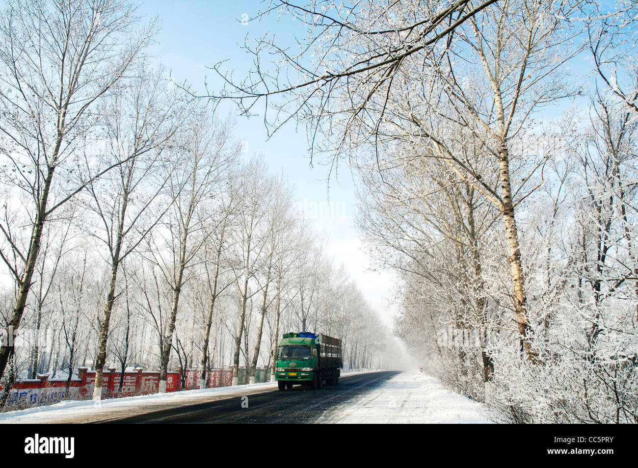 Truck speeding on a country road, Jilin, Jilin , China Stock Photo