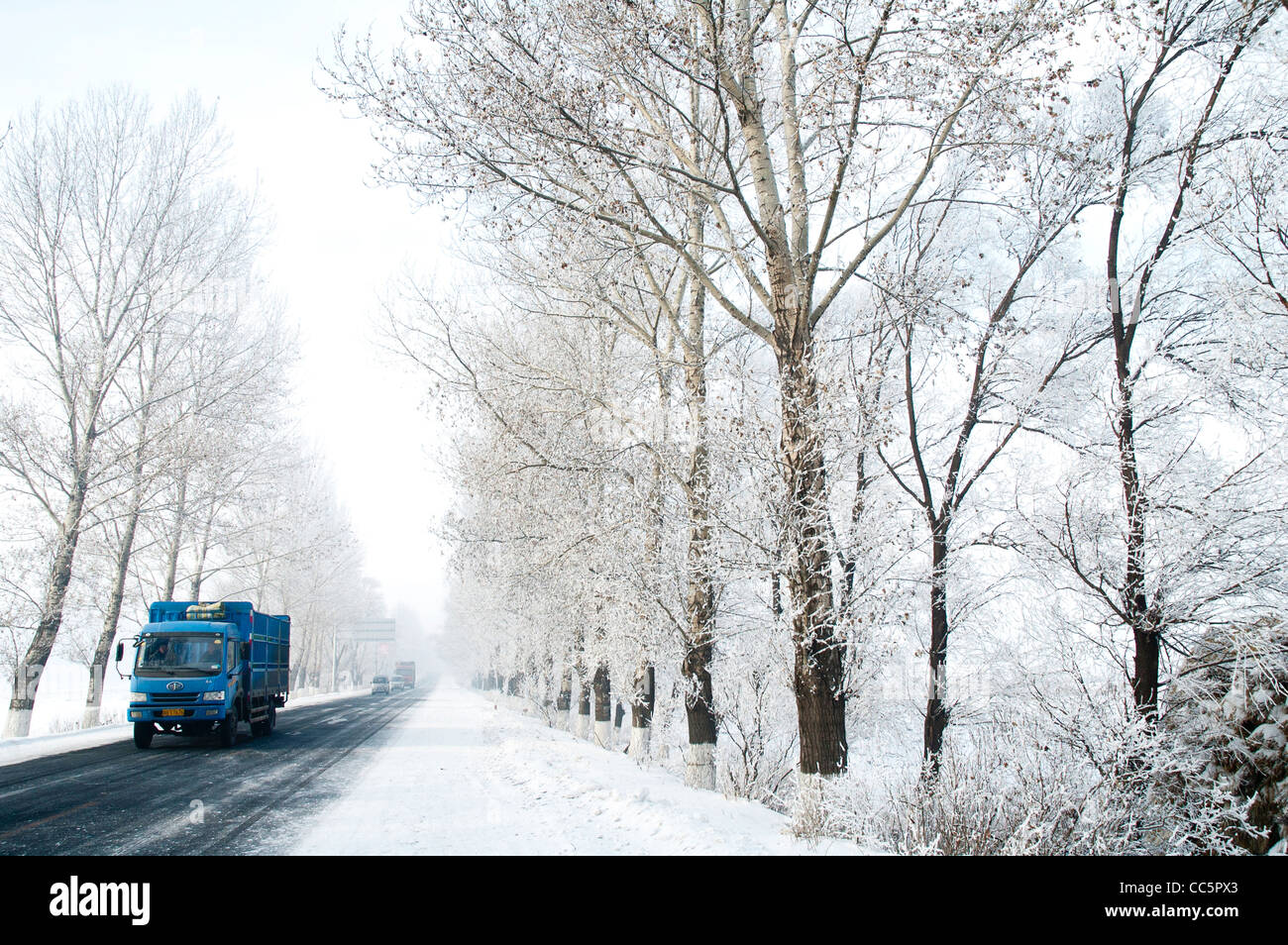 Truck speeding on a country road, Jilin, Jilin , China Stock Photo