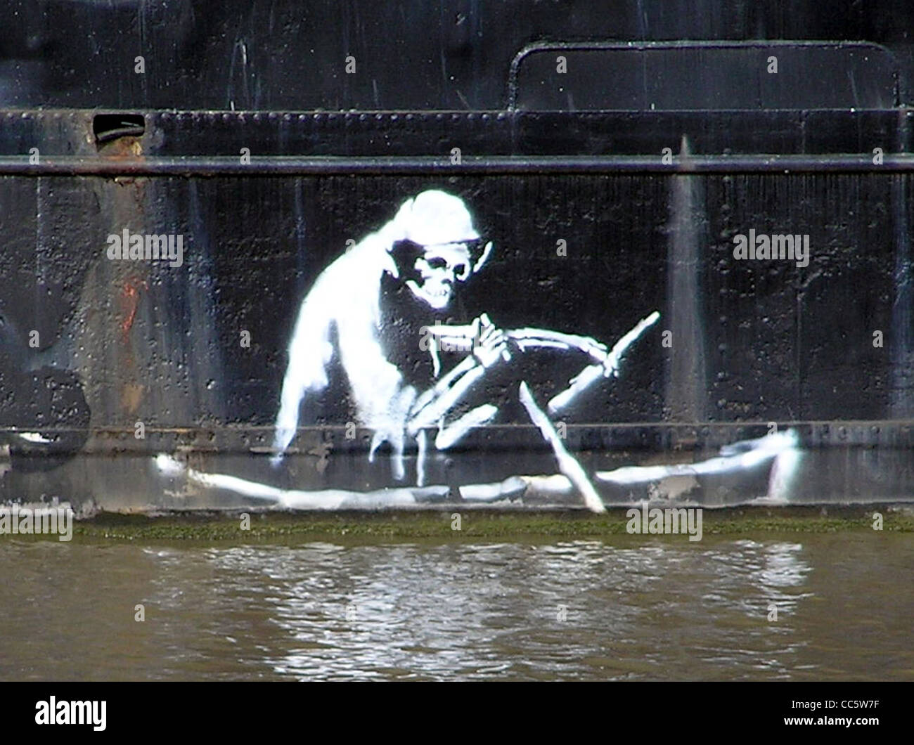 An art work by Banksy, on the Thekla Social entertainment boat, central Bristol, England. Stock Photo