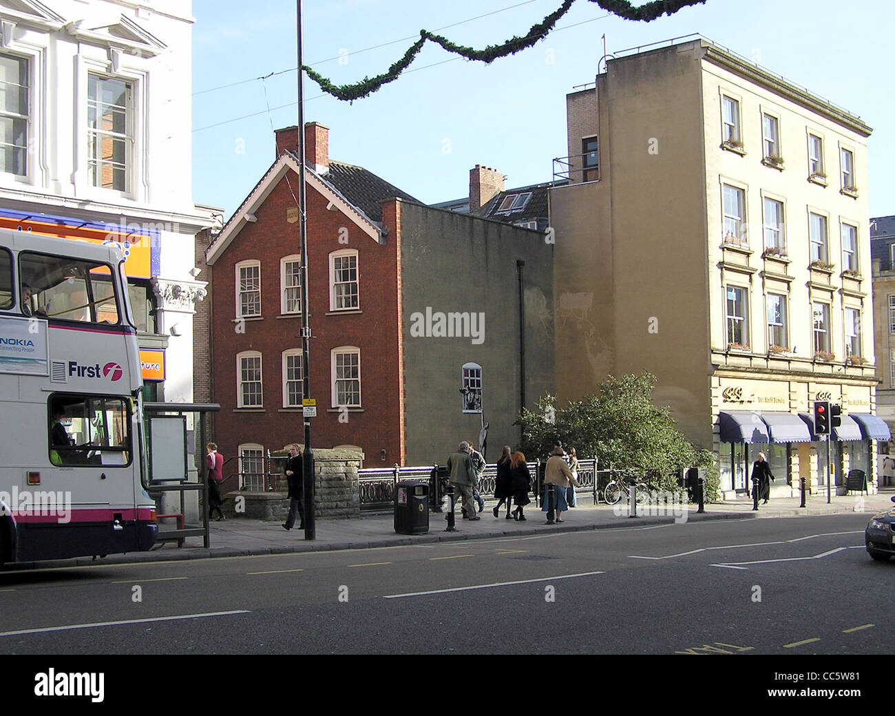 An art work by Banksy, at the bottom of Park Street, Bristol, England. The Council have decided not to clean it off. Stock Photo