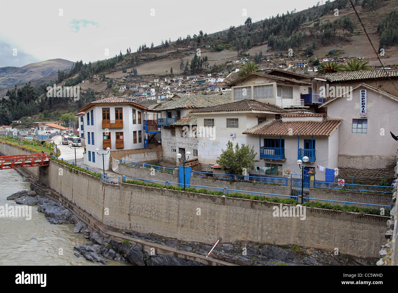 A lovely small mountain village along a river in the Andes Mountains, Peru Stock Photo