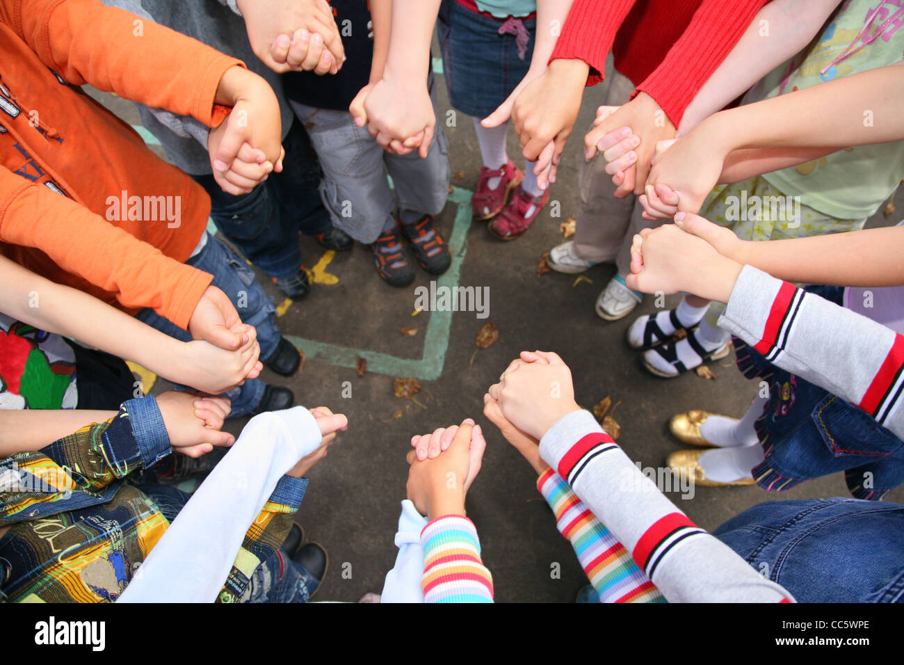 Circle from children, who are held for hands, kindergarten Stock Photo