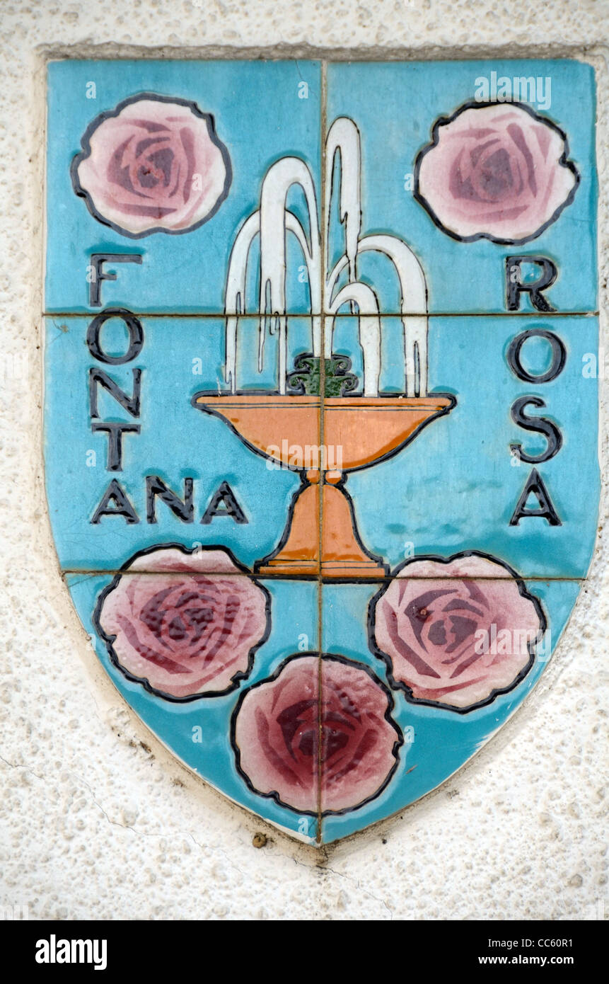 Tile Sign at Entrance to the Fontana Rosa Garden with a Fountain and Roses in Ceramic Tiles or Tilework Menton Alpes-Maritimes France Stock Photo