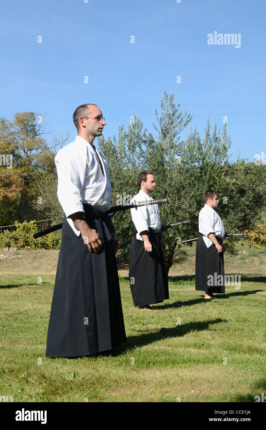 Western Practitioners of Japanese Martial Arts Swordsmanship, Sword Fight or Fighting, Kendo, Kenjutsu or Katana Stock Photo