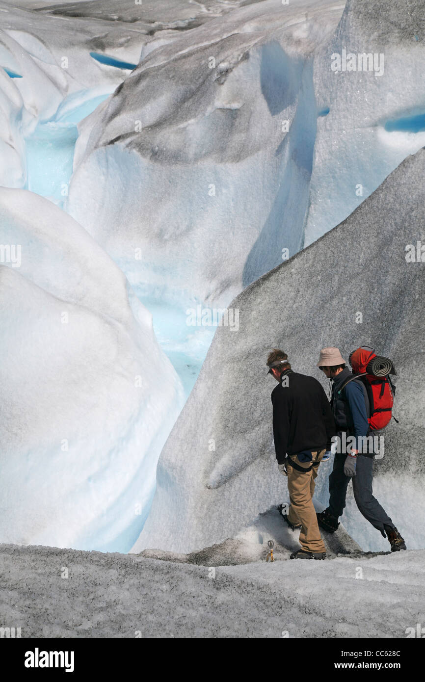 Tourists walking on the Perito Moreno glacier in the Los Glaciares National Park, Patagonia, Argentina Stock Photo