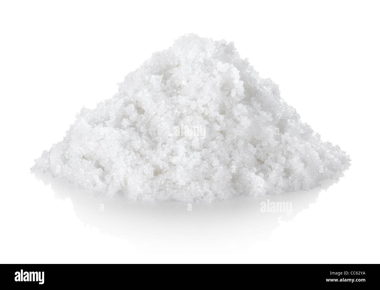 Heap of white processed granulated sugar, isolated on a white background. Stock Photo